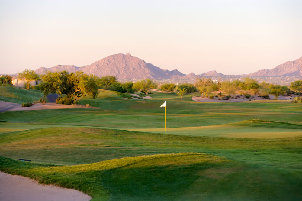 Golf Course in the Arizona Desert With Mountains in the Late Afternoon Sun