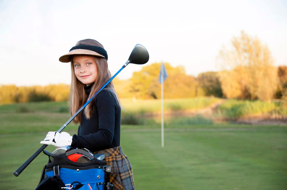 A Happy Young Girl at the Golf Course