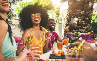 Multiracial Group of Friends Having Fun at Backyard Home Party